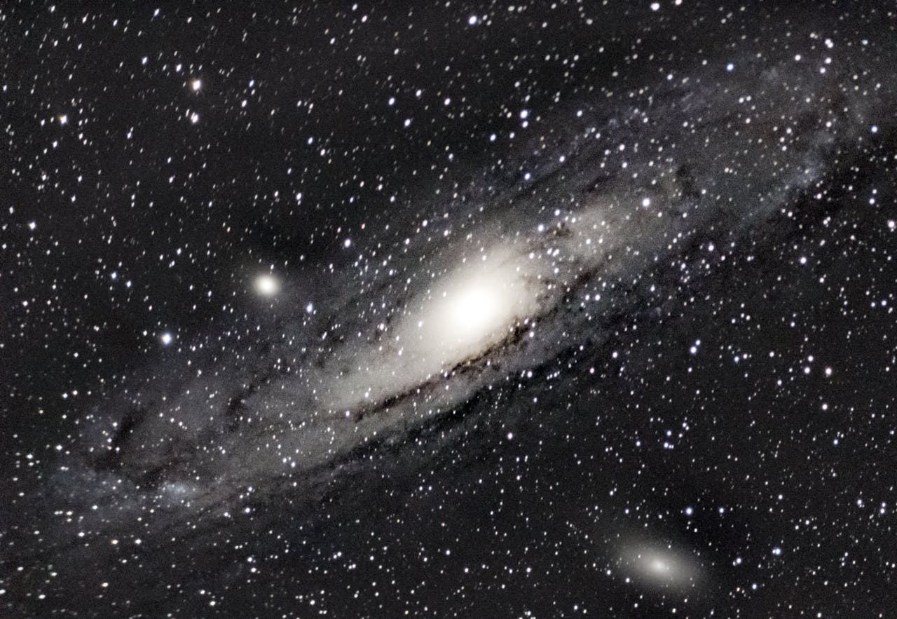 An awe-inspiring capture of the Andromeda Galaxy surrounded by countless stars in the night sky.